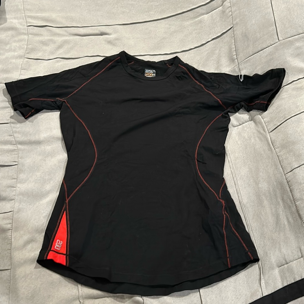 Icebreaker merino wool short sleeve baselayer top.